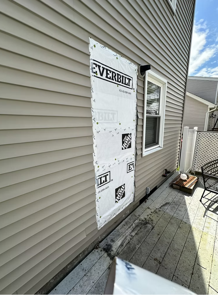 Door fill and siding repair